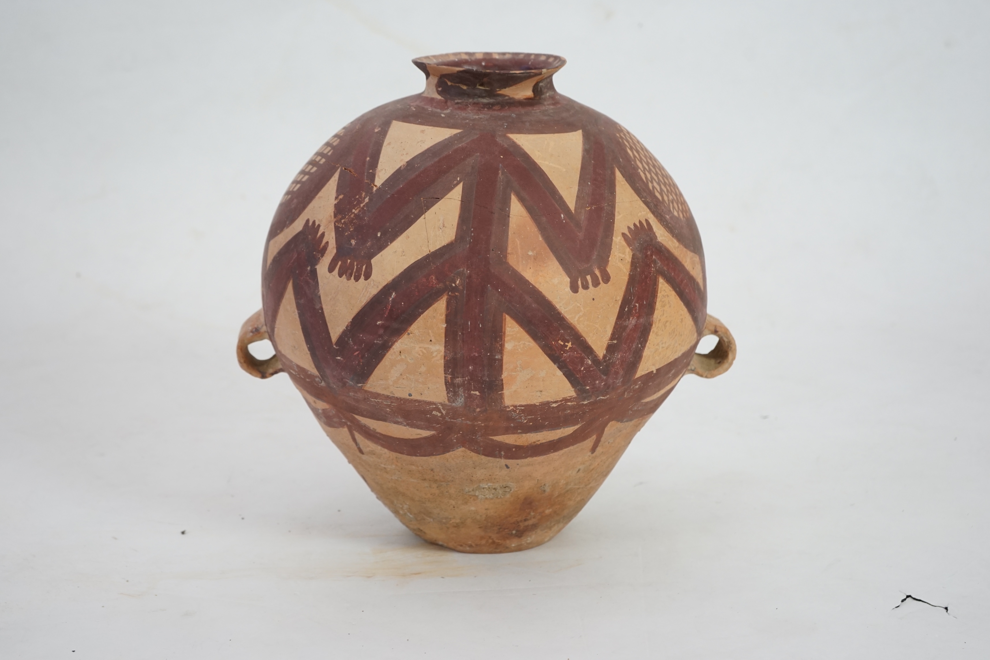 A large Chinese Neolithic Machang painted pottery jar, c.2300-2000 BC) of the Majiayao culture